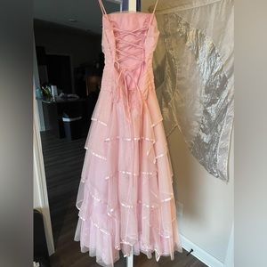 Blush pink corset back prom dress with spaghetti straps